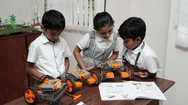 Children participating in hands-on experiential learning activities to develop practical knowledge and problem-solving skills